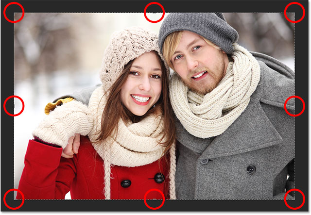 The default crop border and crop handles around the image. Image © 2016 Photoshop Essentials.com